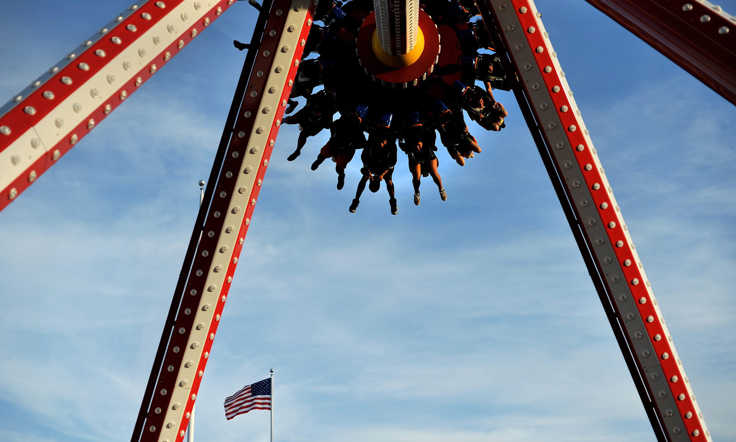 A group of people are flipped upside down the Luna 360, an amusement ride at Coney Island in Brooklyn, N.Y., on May 26, 2014.