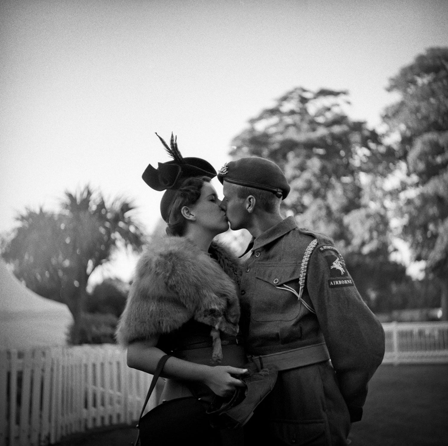 Young reenactors Laura Blanchard and Ieuan Joe Smith (who's dressed as a Private, C Company, 2nd Battalion South Staffordshire Regiment, British 1st Airborne Division) share a kiss at the War & Peace Revival in Folkestone, England on July 17, 2013.