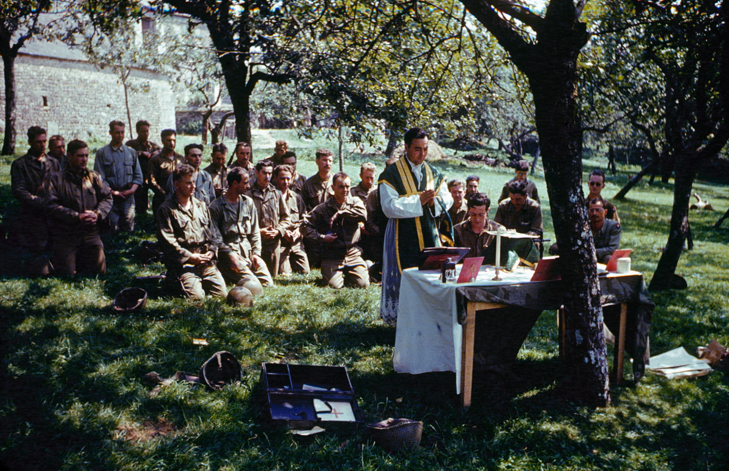 Church services in dappled sunlight, France, 1944.