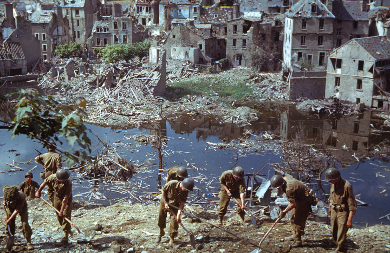 American troops clear wreckage in Saint-Lô, Normandy, 1944.