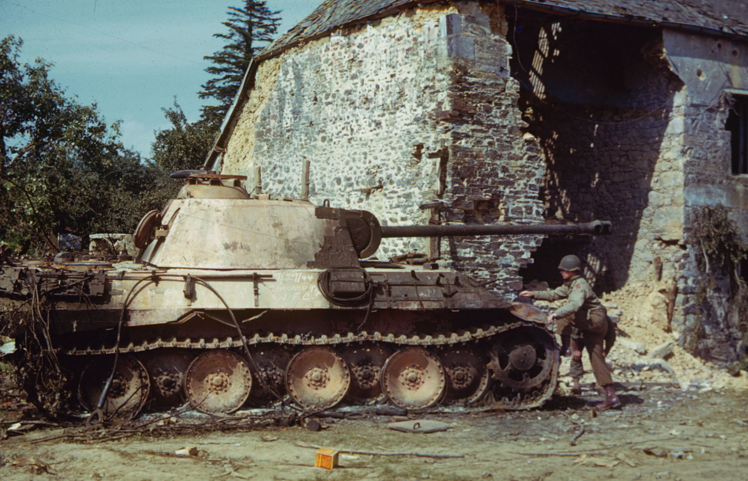 Ruined tank near St. Gilles (or perhaps Hambye), France, 1944.
