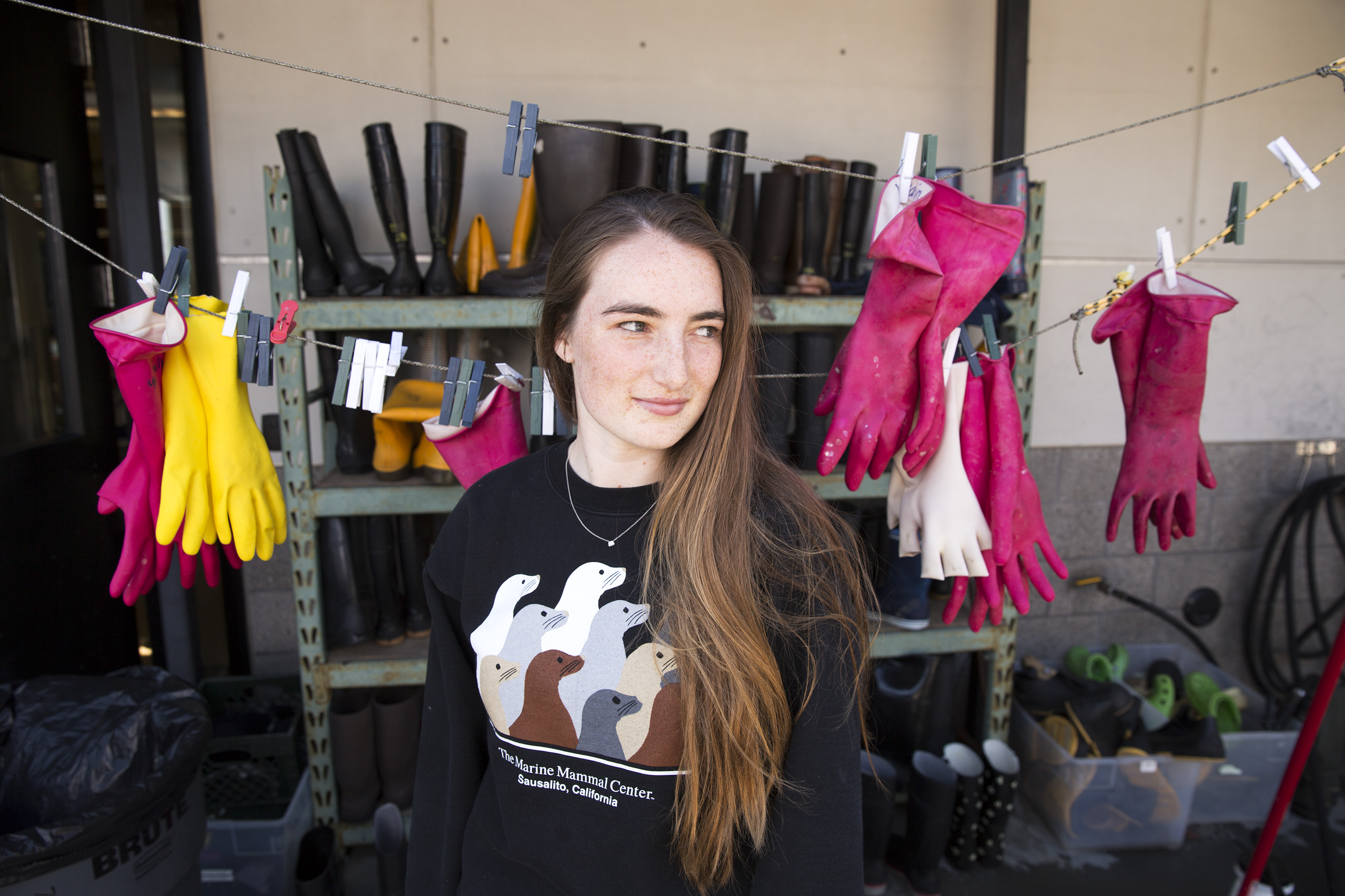 Siobhan Rickert, 18, has been a volunteer at the Marine Mammal Center for four years  She is one of a dedicated network of 1,100 volunteers who help run the facility in Marin County, Calif., May 9, 2014.