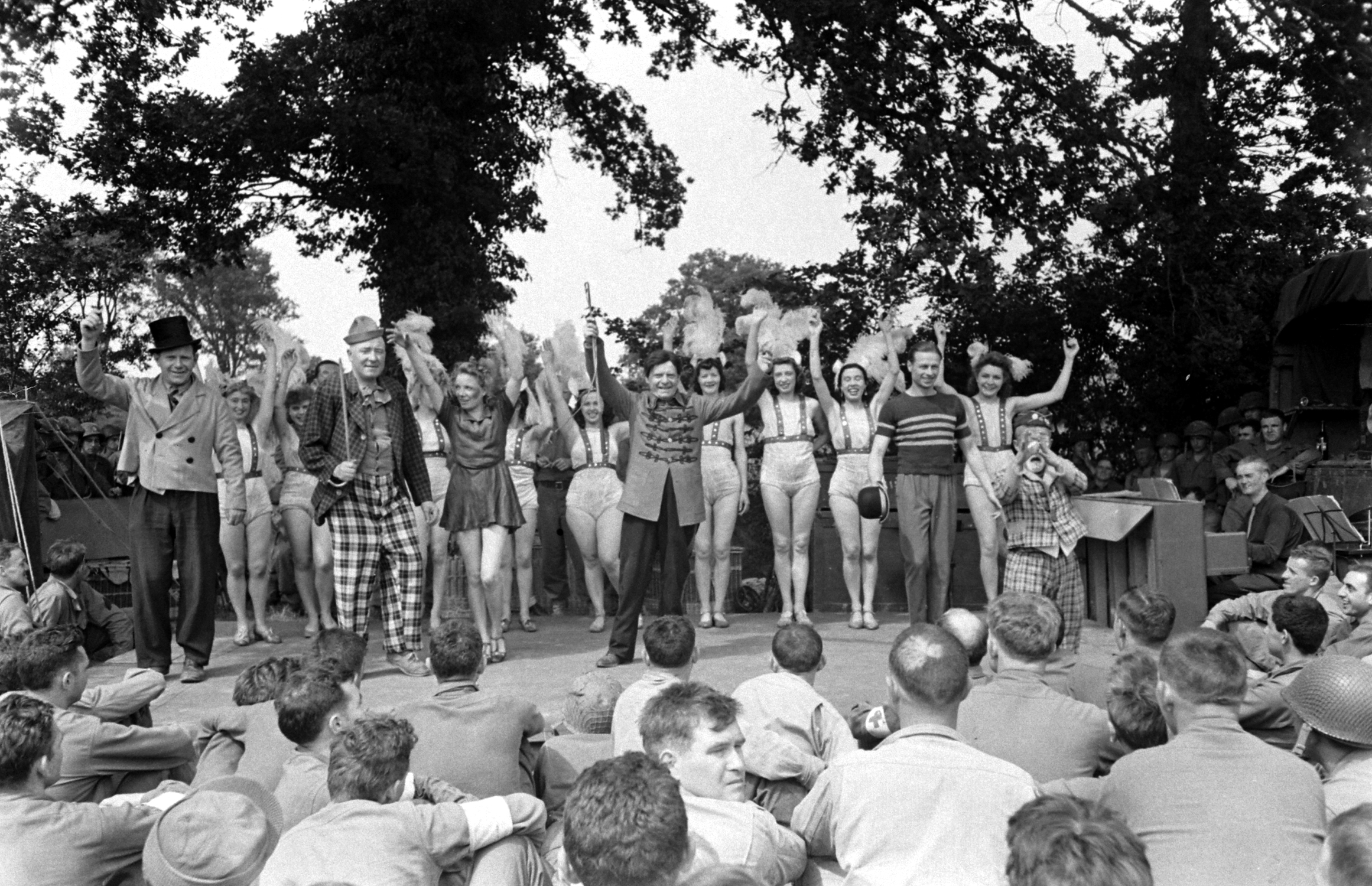 French performers in first organized show for American troops after D-Day take a bow, Normandy, July 1944.