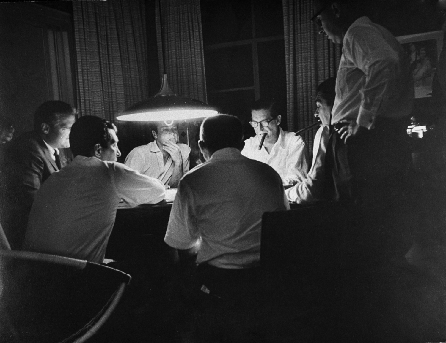 Poker pals in a table stakes game at Martin's home include (clockwise from Dean at left) agent Jerry Gershwin, Tony Curtis, Milton Berle, Ernie Kovacs with 85-cent cigar, director Billy Wilder.