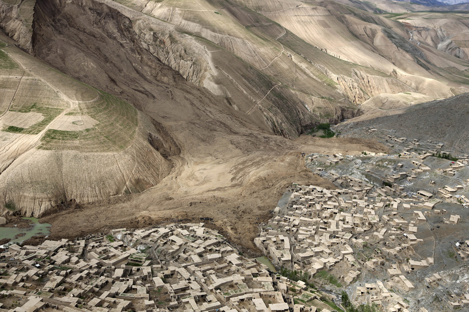 An aerial view of the landslide that buried Abi Barik village in Badakhshan province, northeastern Afghanistan, on May 5, 2014.