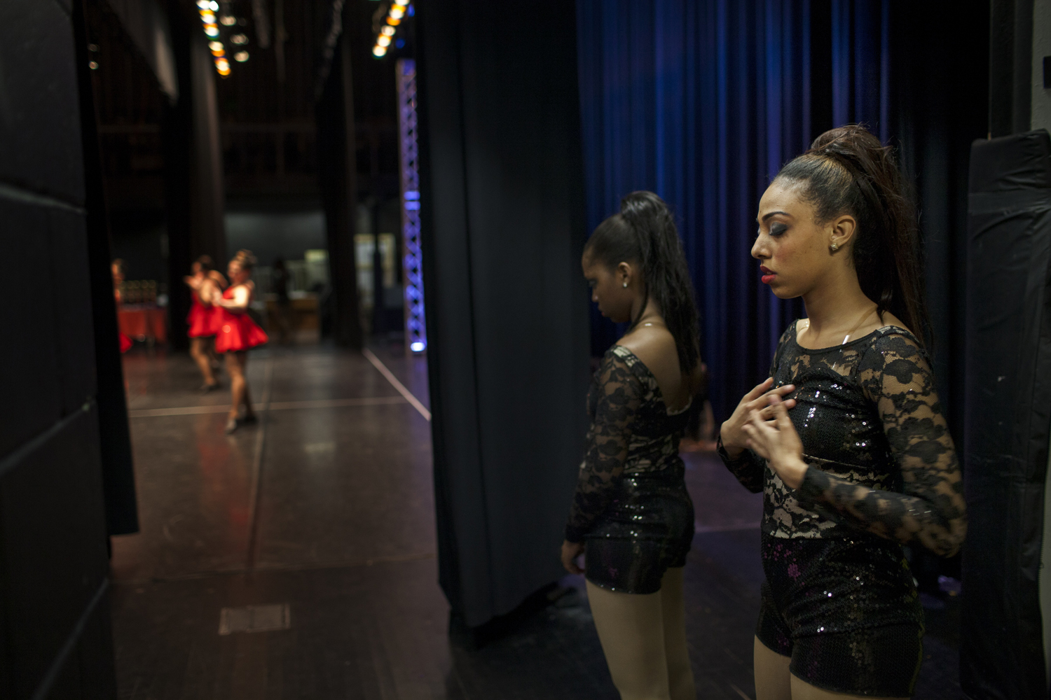 May 4th, 2013. Long Island, New York. Backstage at a dance competition with her dance school's team, Sarah takes a moment to center herself before she performs.