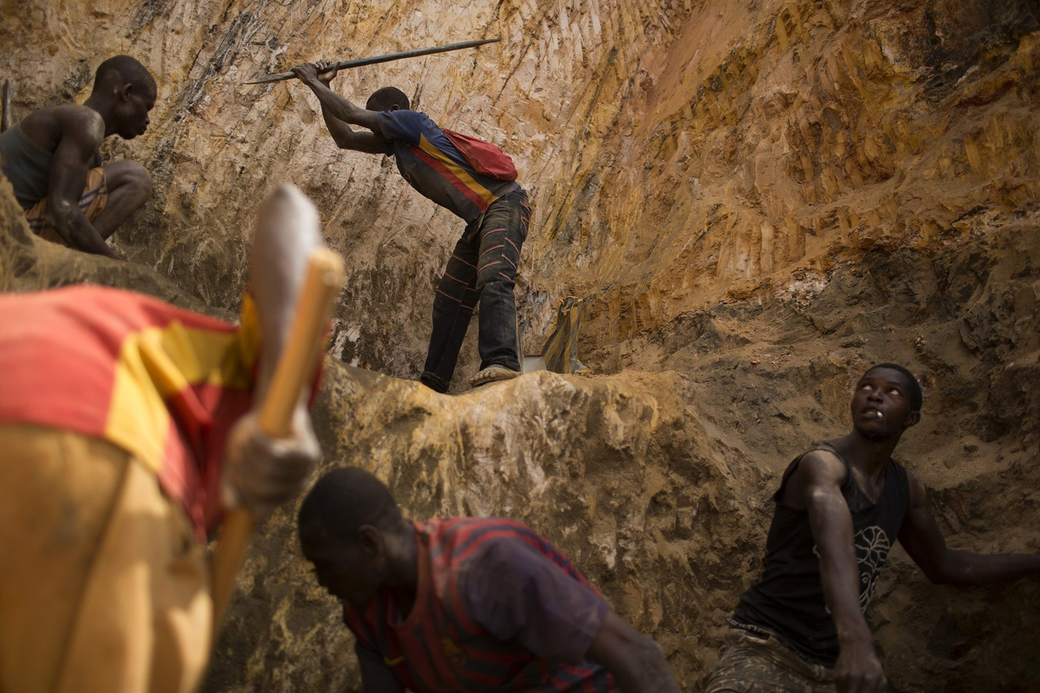 Prospectors work at an open-pit at the Ndassima gold mine, near Djoubissi north of Bambari