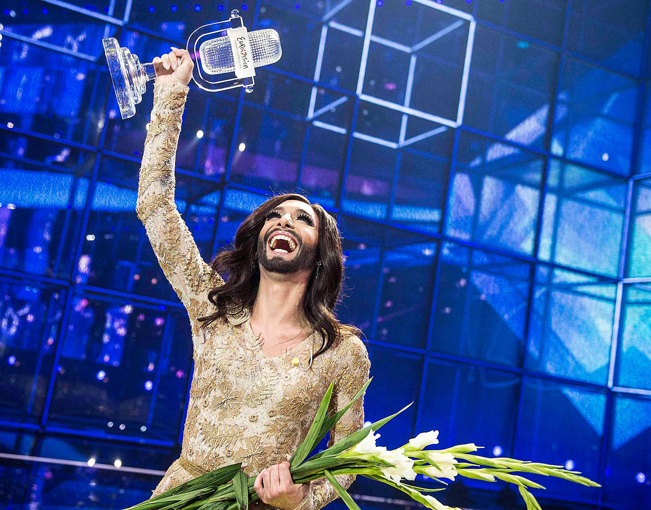 Conchita Wurst representing Austria celebrates with the trophy after winning the 59th annual Eurovision Song Contest (ESC) at the BW Hallerne in Copenhagen, in this May 10, 2014 picture provided by Scanpix Denmark. (Scanpix Denmark/Reuters)