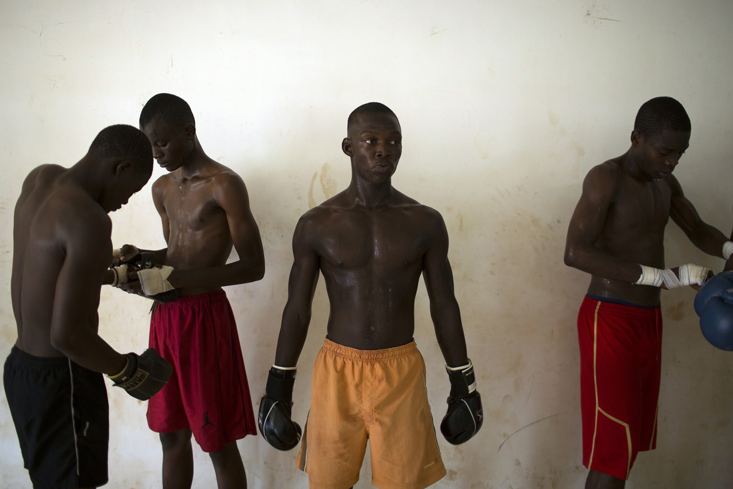 Men take part in Thai boxing training in Bangui