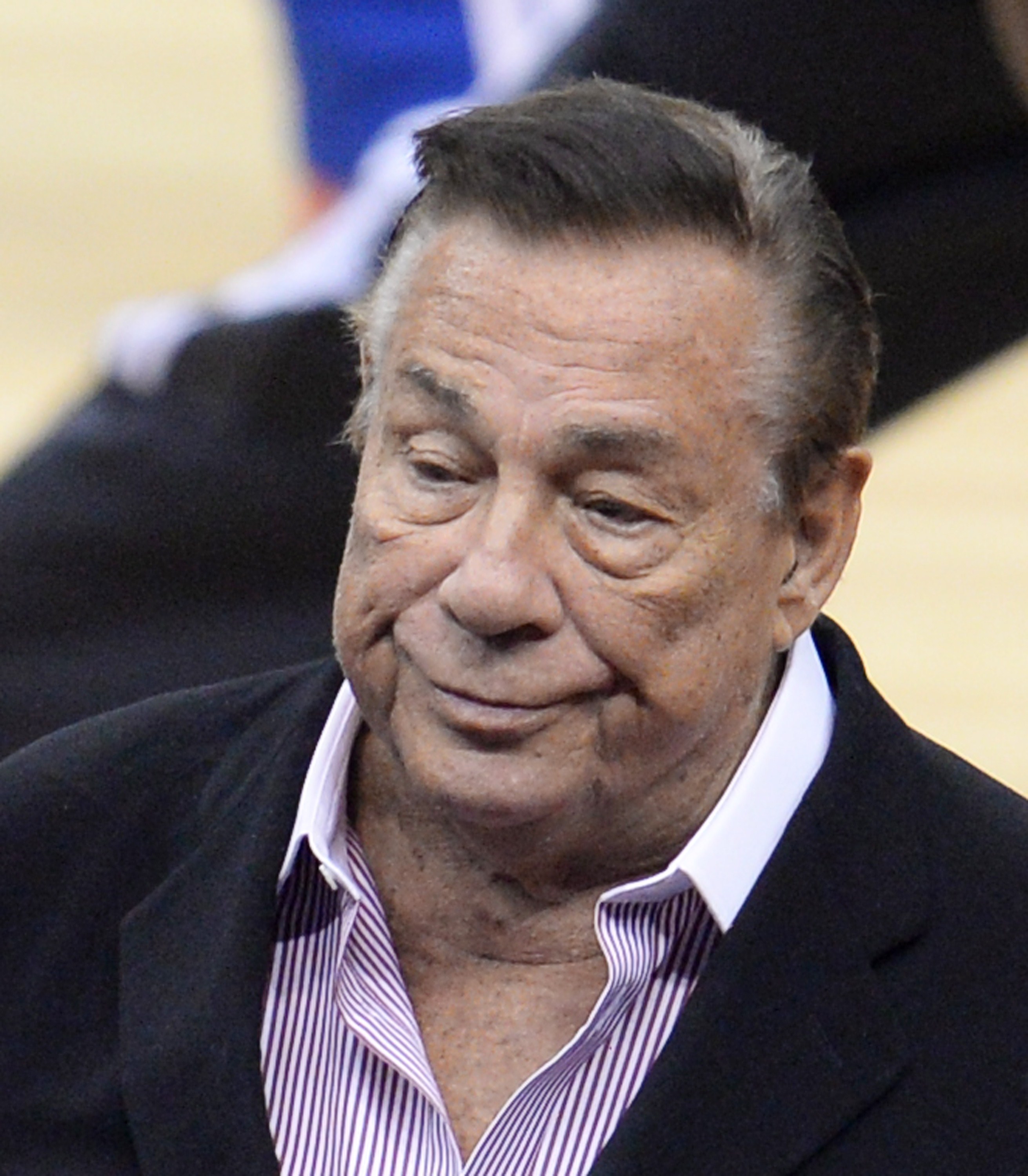 Los Angeles Clippers owner Donald Sterling attends the NBA playoff game between the Clippers and the Golden State Warriors on April 21, 2014 at Staples Center in Los Angeles, California. The NBA banned Sterling for life for "deeply offensive and harmful" racist comments that sparked a national firestorm. NBA Commissioner Adam Silver hit Sterling with every penalty at his disposal, fining him a maximum $2.5 million dollars and calling on other owners to force him to sell his team.   AFP PHOTO / ROBYN BECK        (Photo credit should read ROBYN BECK/AFP/Getty Images) (ROBYN BECK&mdash;AFP/Getty Images)