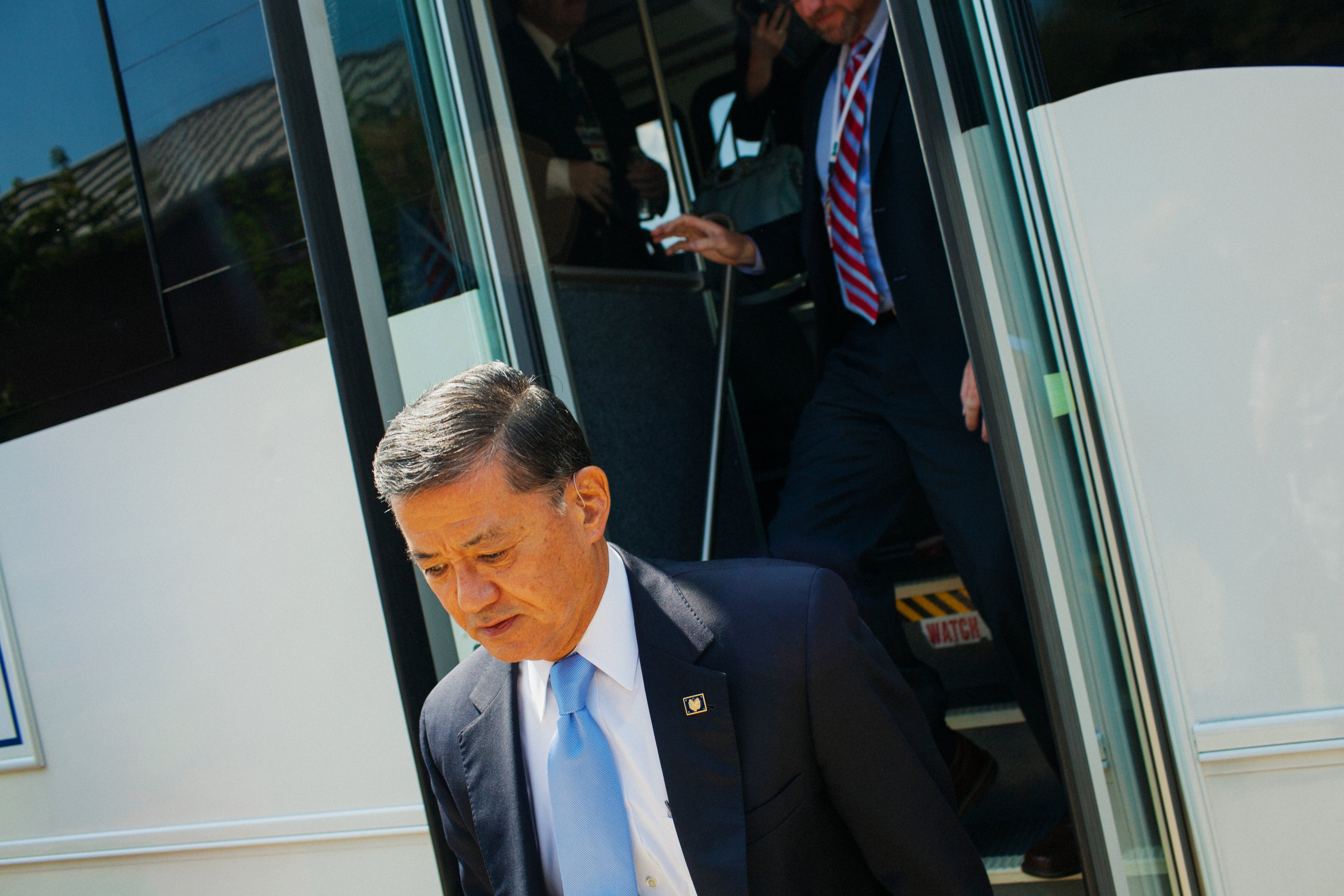 Secretary of Veterans Affairs, Eric K. Shinseki exits a shuttle while being given a tour of the VA Medical Center-Hampton, in Hampton, Virginia. (The Washington Post/Getty Images)