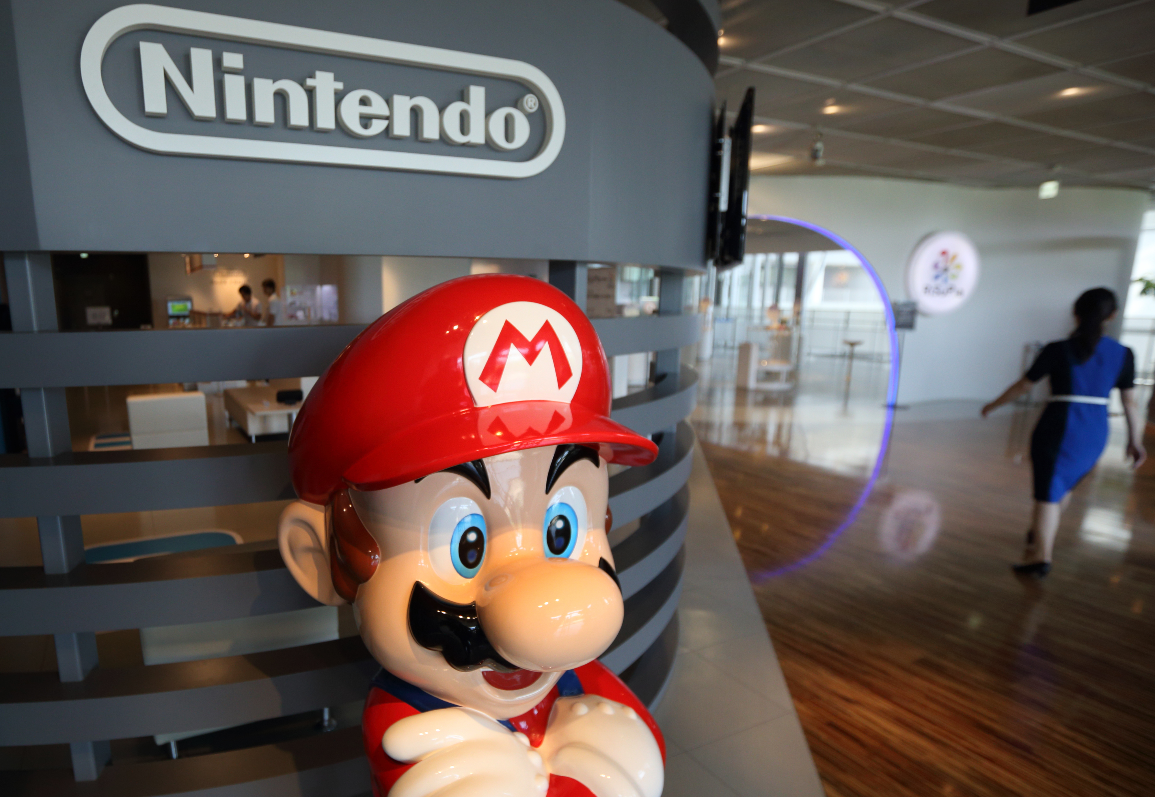 A statue of Nintendo Co.'s video-game character Mario stands at the company's showroom in Tokyo on Wednesday, May 7, 2014. (Tomohiro Ohsumi—Bloomberg/Getty Images)
