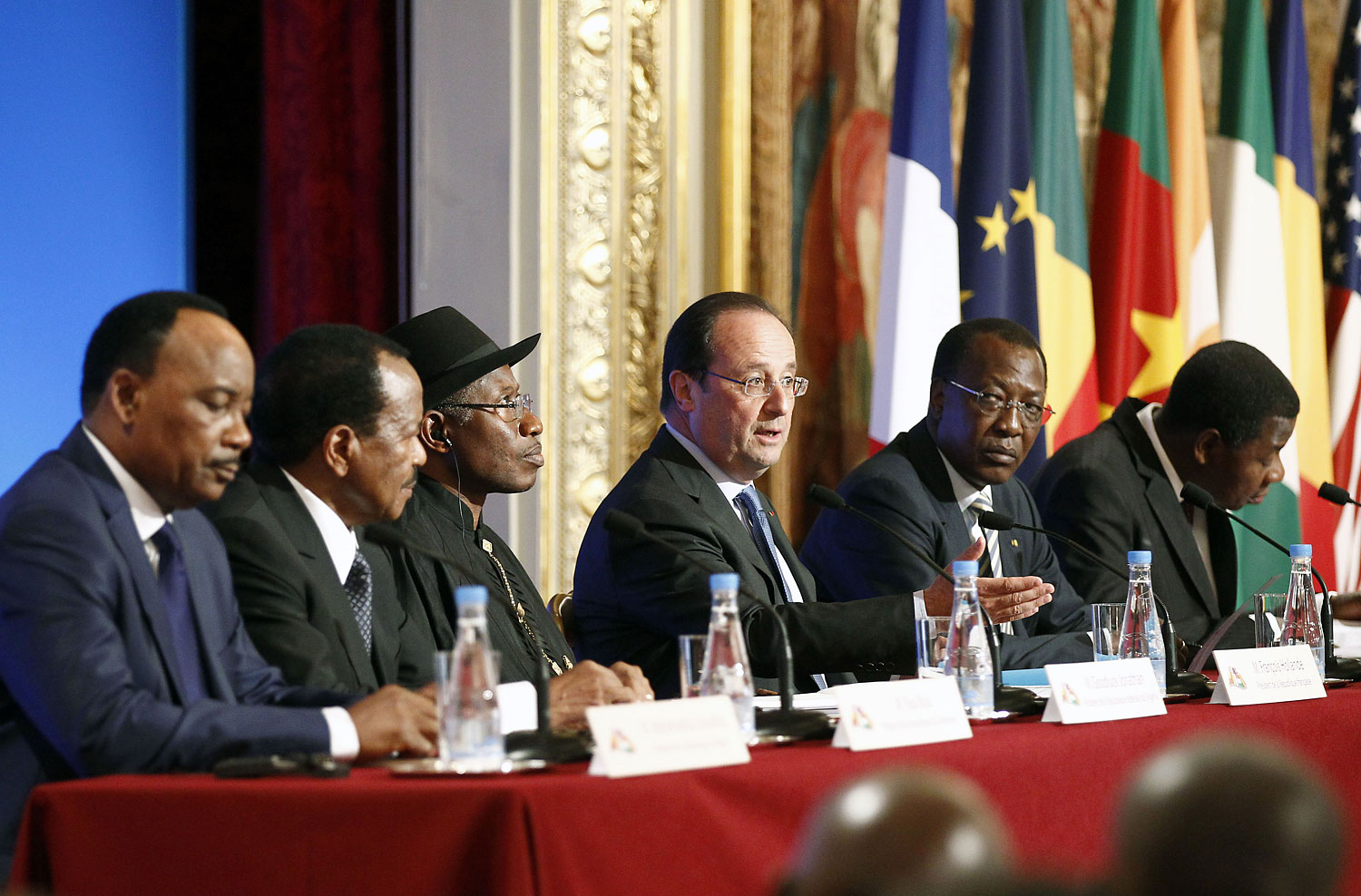 From left: Niger's President Mahamadou Issoufou, Cameroon's President Paul Biya, Nigeria's President Goodluck Jonathan, French President François Hollande, Chad's President Idriss Déby and Benin's President Thomas Boni Yayi attend a  joint press conference at the Élysée Palace in Paris on May 17, 2014 (Thierry Chesnot—Getty Images)