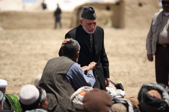 President Hamid Karzai visited Abi Barik and spoke to villagers following the landslides. He appeased one man who had stood up to speak and passionately raise his concerns, May 7, 2014.