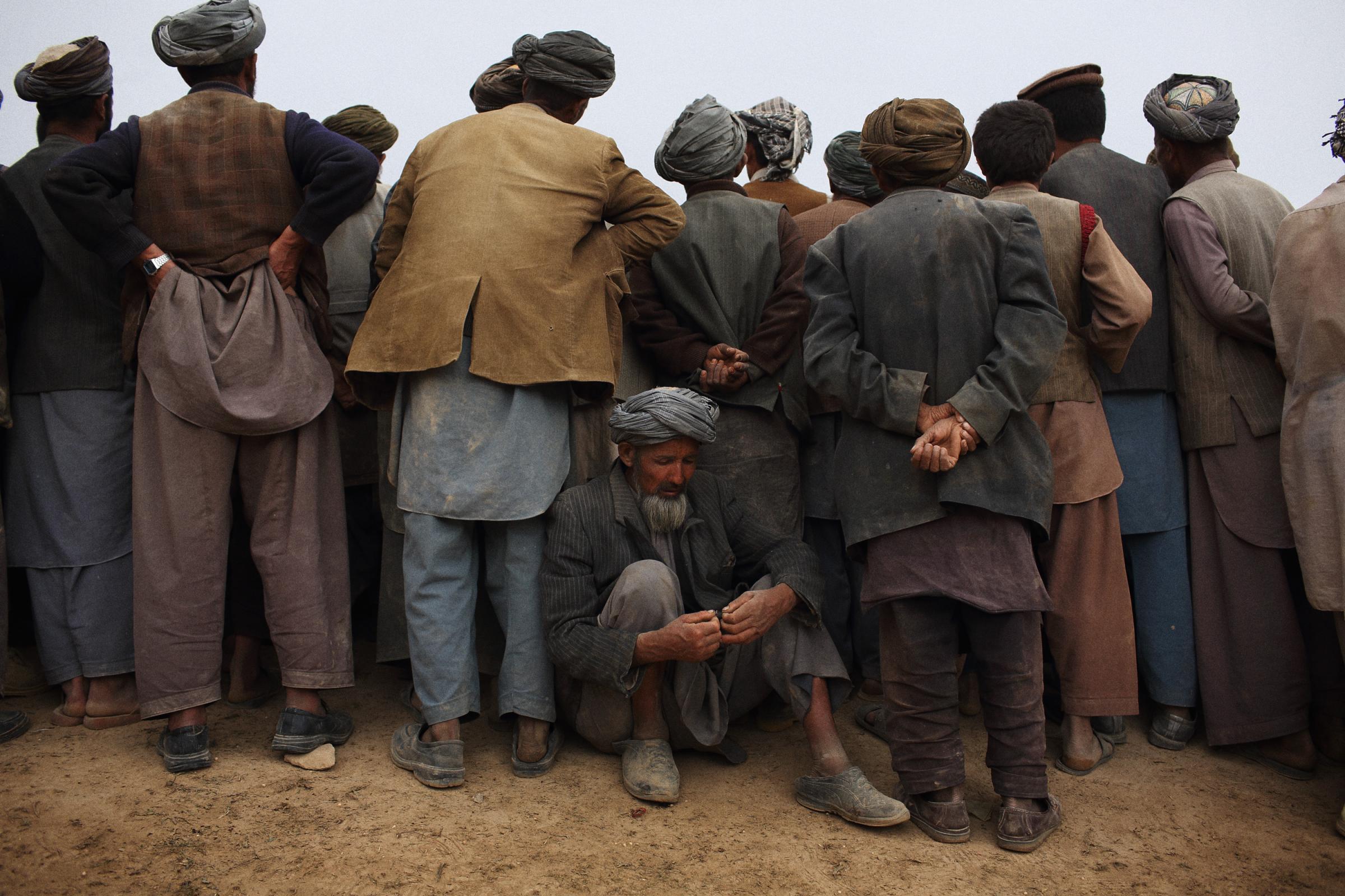 A meeting is held in the center of the village following clashes between police and locals, May 6, 2014.