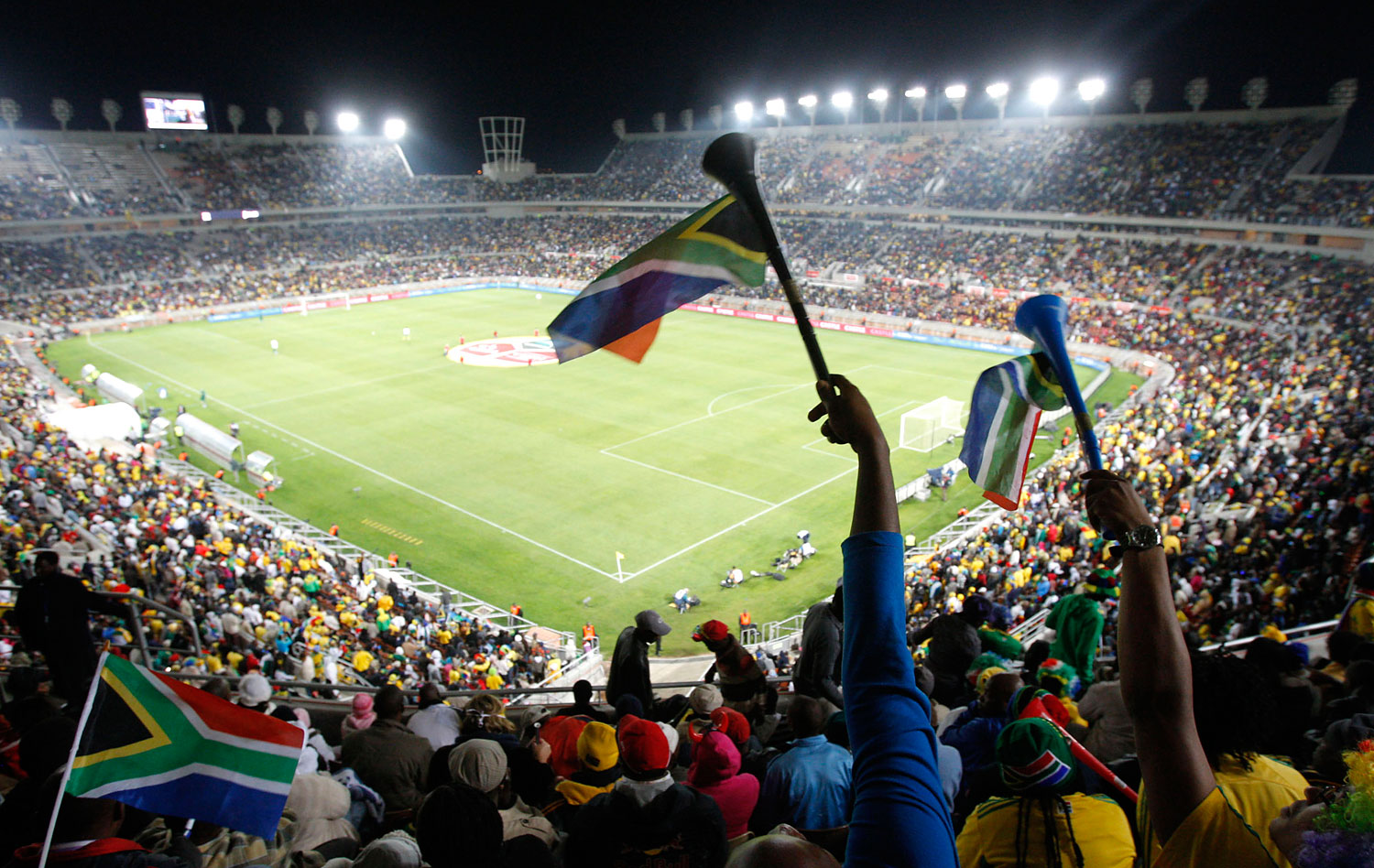 Spectators attend an exhibition soccer match between South Africa and Guatemala at the Peter Mokaba Stadium in Polokwane, South Africa, May 31, 2010. (AP)