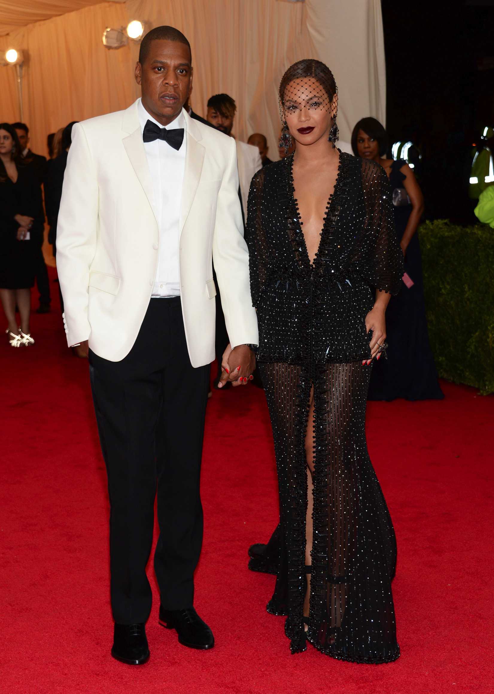 This May 5, 2014 file photo shows Jay Z, left, and Beyonce at The Metropolitan Museum of Art's Costume Institute benefit gala celebrating "Charles James: Beyond Fashion" in New York, on the night when Beyonce's sister allegedly attacked Jay Z. (Evan Agostini—Invision/AP)