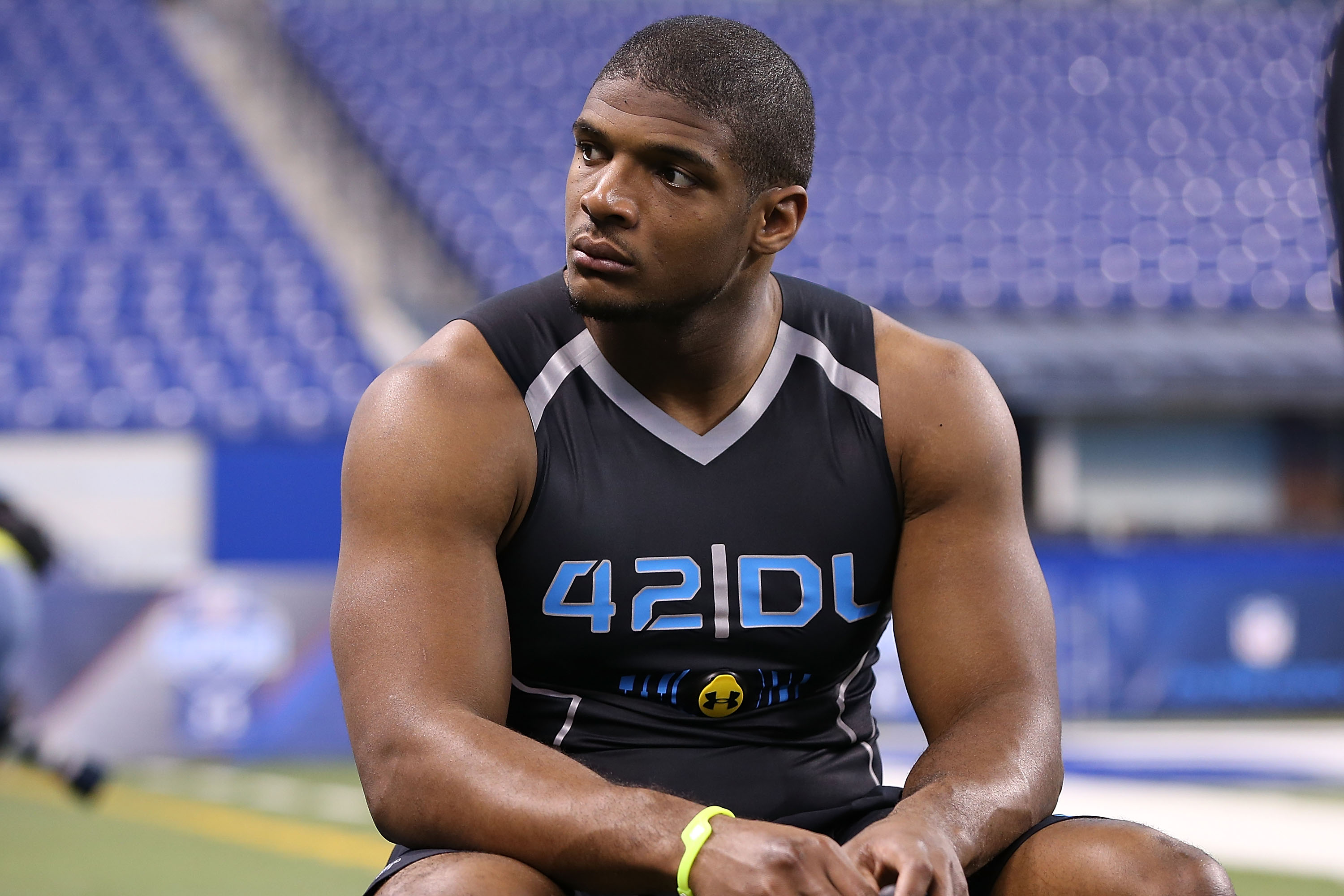 University of Missouri defensive end Michael Sam warms up at the 2014 NFL Scouting Combine at Lucas Oil Stadium in Indianapolis, on Feb. 24, 2014. (Ben Liebenberg—AP)