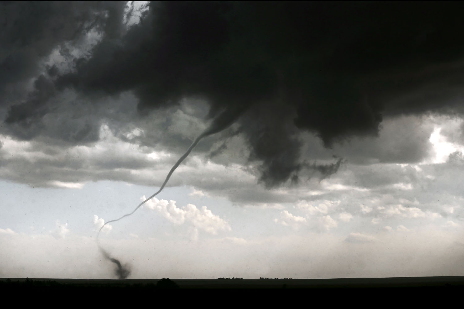 May 7, 2014. A tornado touches down in a field in Akron, Colo. during a severe weather outbreak.