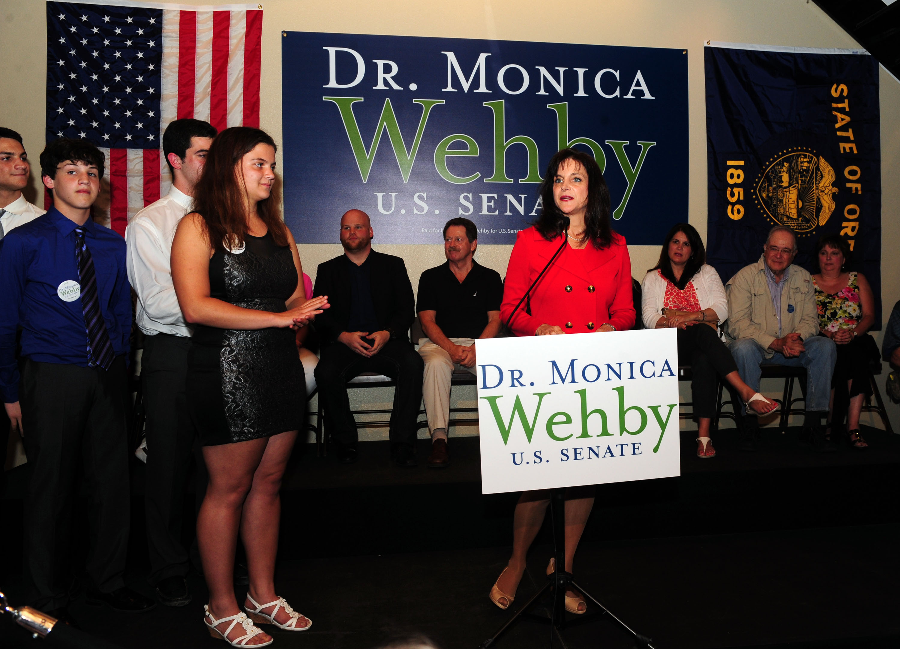 With her children at her side, Dr. Monica Wehby greets supporters at the headquarters in Oregon City, Oregon after winning the Oregon Republican Primary race for Senate on Tuesday, May. 20, 2014. (STEVE DYKE—AP)