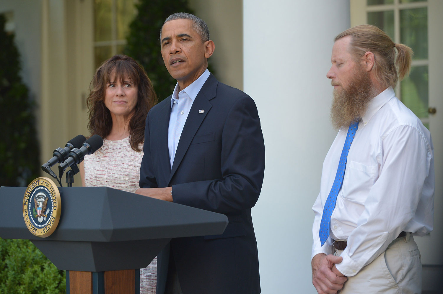 President Barack Obama speaks with Jani Bergdahl, left, and Bob Bergdahl, right, the parents of U.S. Army Sgt. Bowe Bergdahl, in the Rose Garden of the White House in Washington, after the announcement that Bowe Bergdahl has been released from captivity, May 31, 2014. (Ngan Mandel—AFP/Getty Images)
