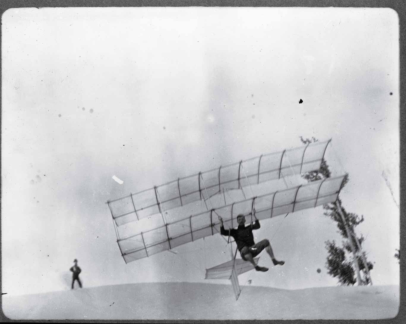 <em>Augustus Herring, who later joined forces with a rival of the Wright brothers’, Glenn Curtiss, tests a Herring-Chanute glider in 1896</em> (Courtesy Library of Congress)