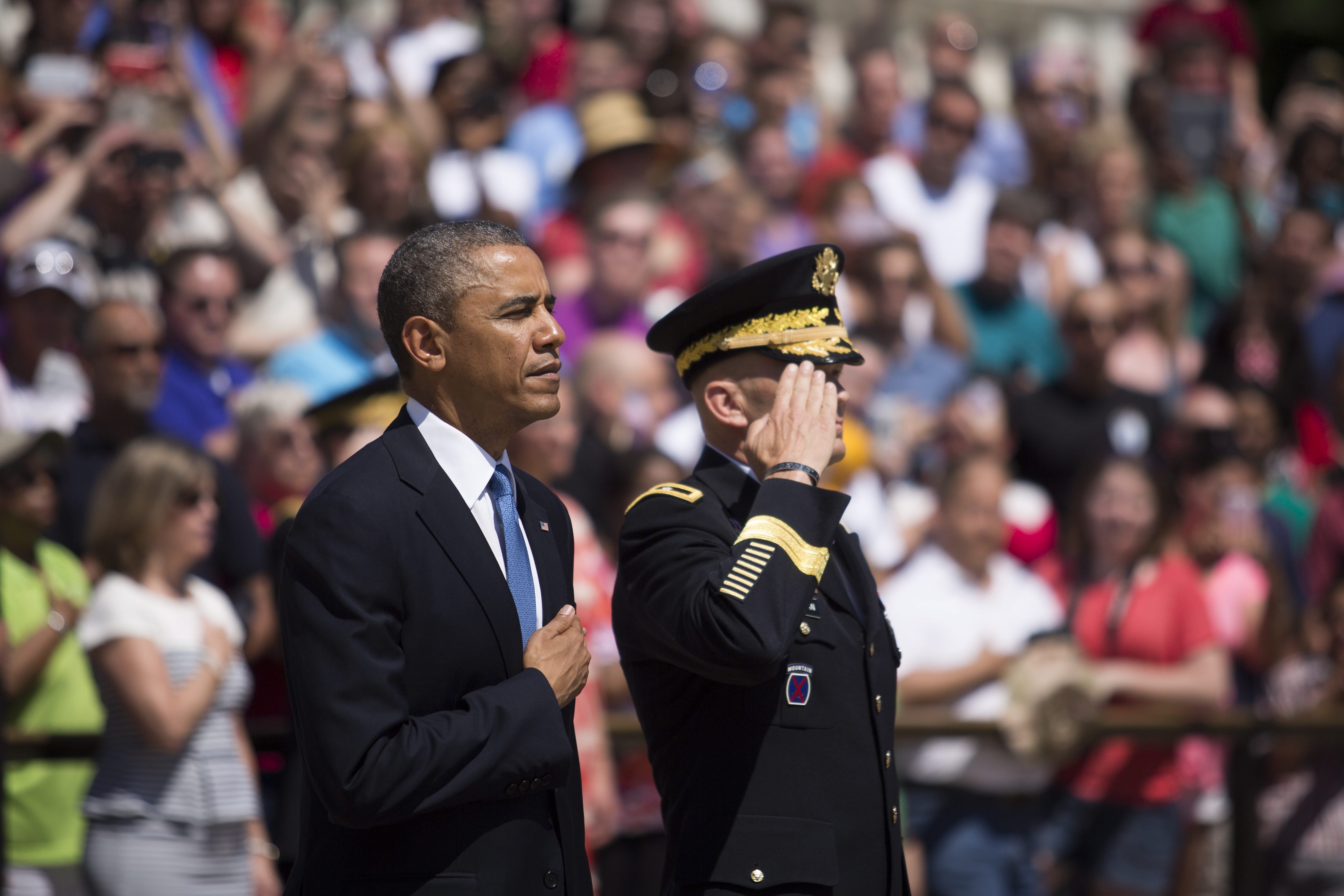 U.S. President Barack Obama and Major General Jeffrey Buchanan participate in a wreath laying ceremony at the Tomb of the Unknown Soldier at Arlington National Cemetery in Arlington, Va. on May 26, 2014. (Drew Angerer—EPA)