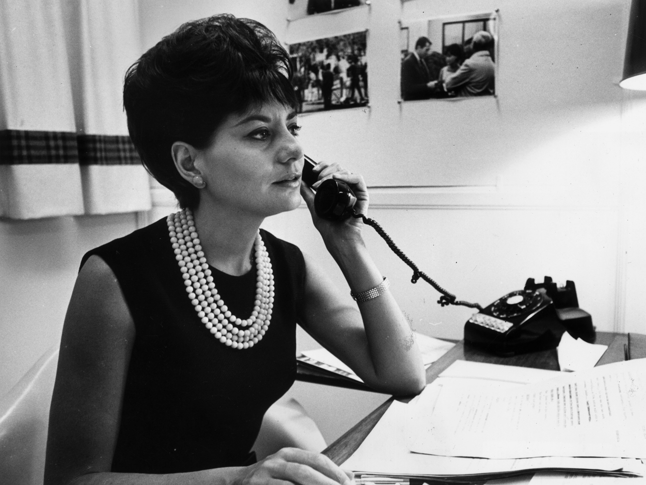 NBC's Barbara Walters takes a phone call at her desk in New York City, circa 1964.