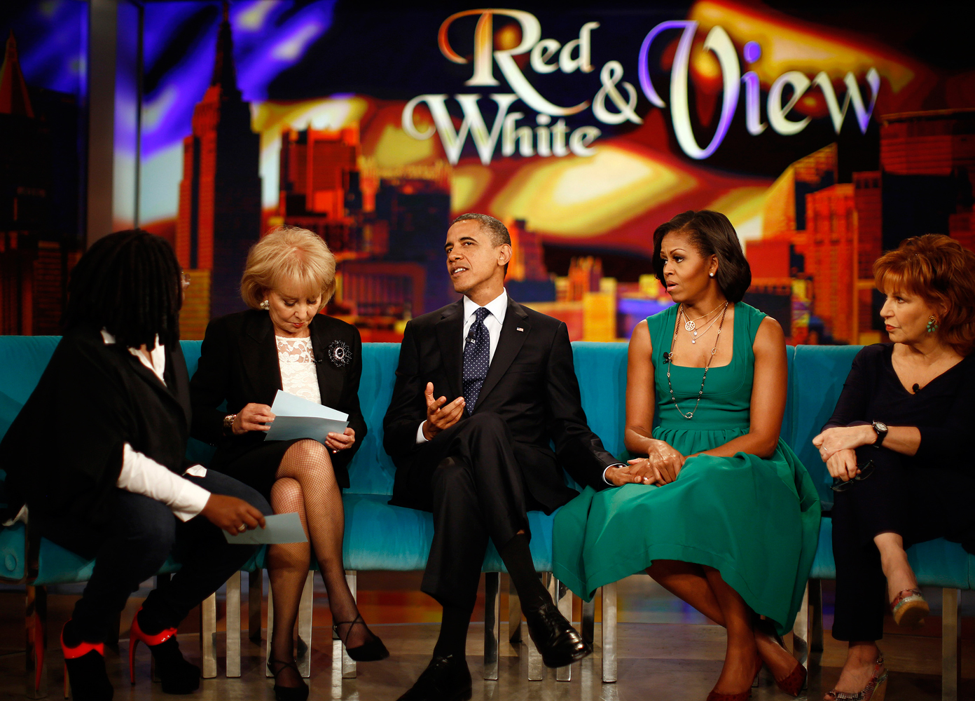 U.S. President Barack Obama and first lady Michelle Obama take part in a taping of the "The View" chat show at ABC's studios in New York, Sept. 24, 2012.