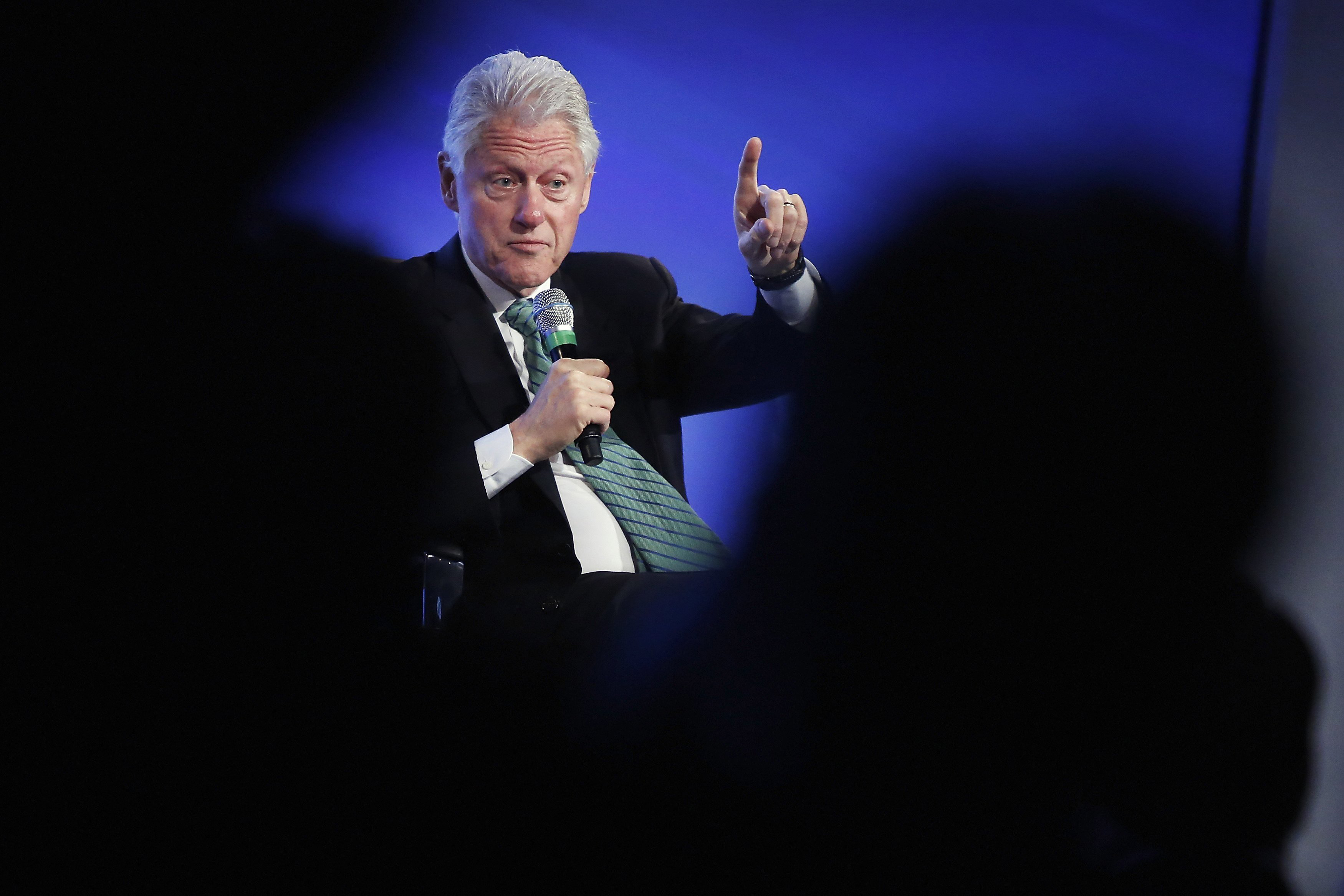 Former President Bill Clinton gestures during an onstage interview at the 2014 Peterson Foundation Fiscal Summit in Washington May 14, 2014. (Jonathan Ernst—Reuters)