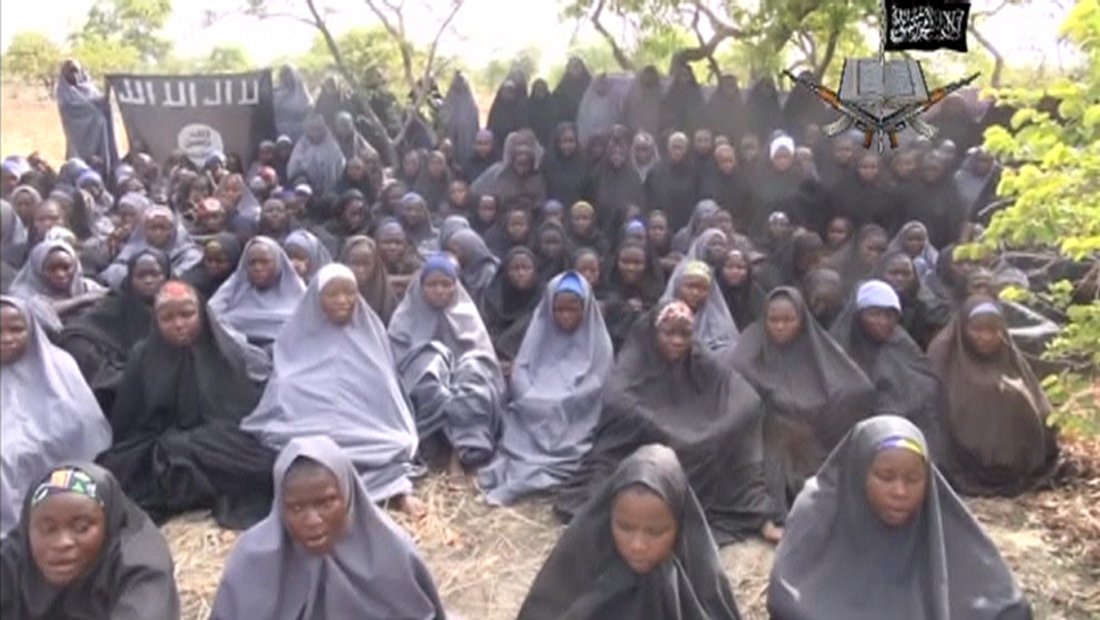 Kidnapped schoolgirls are seen at an unknown location in this still image taken from an undated video released by Boko Haram
