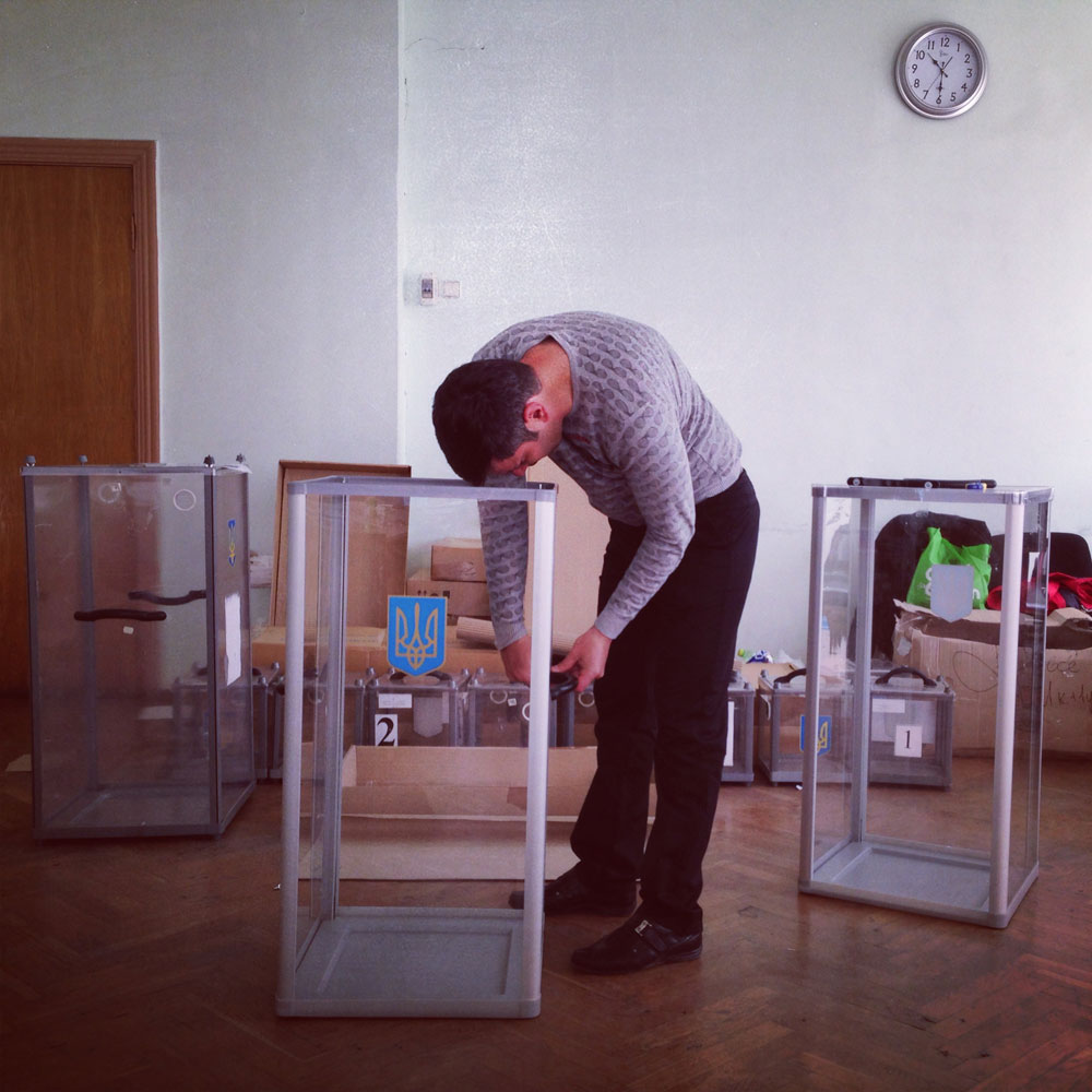 May 10, 2014. A man prepares a polling station for the referendum the following day in Donetsk, Ukraine.