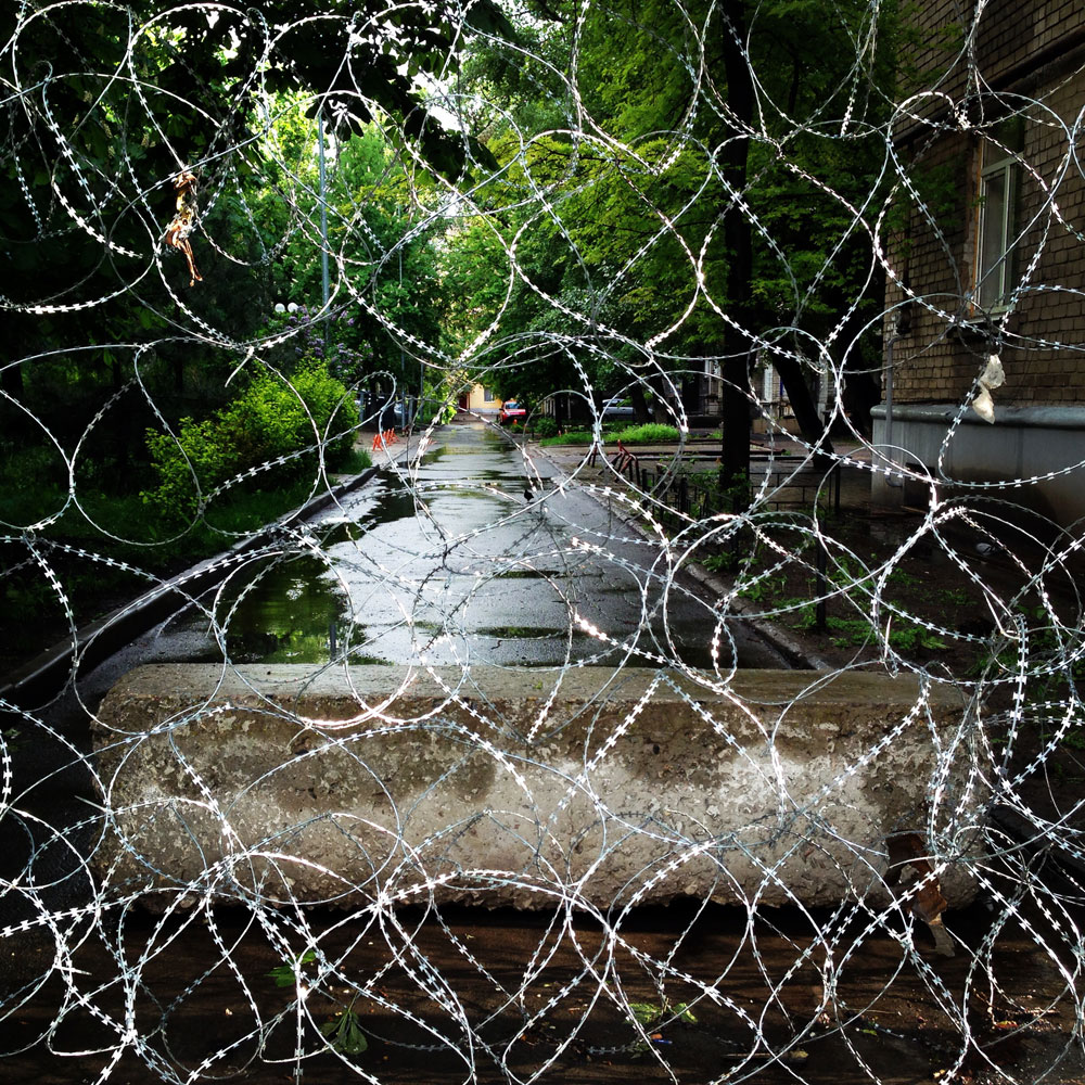 May 8, 2014. A street in Donetsk, Ukraine blocked by barbed wire.