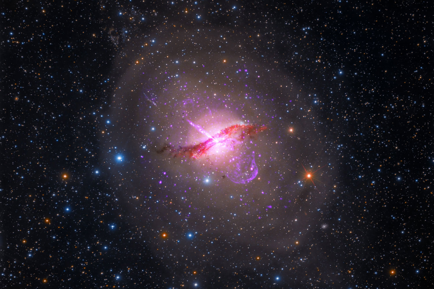 Centaurus A is the fifth brightest galaxy in the sky is famous for the dust lane across its middle and a giant jet blasting away from the supermassive black hole at its center. It is an active galaxy about 12 million light years from Earth.