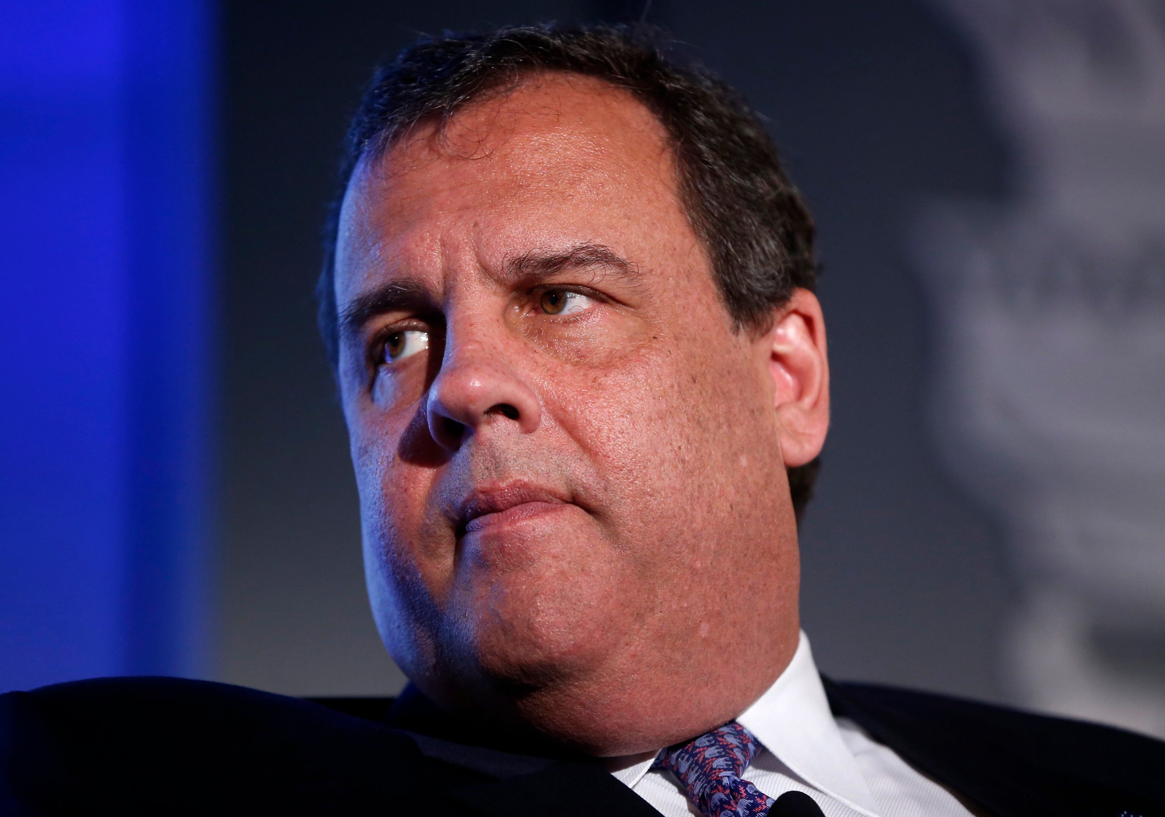 New Jersey Gov. Chris Christie listens to a question from Bob Schieffer of CBS News at the 2014 Fiscal Summit organized by the Peter G. Peterson Foundation in Washington, May 14, 2014.