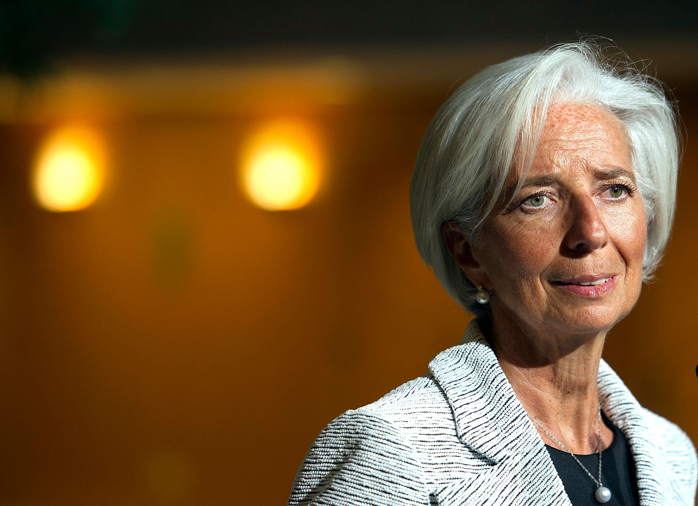 International Monetary Fund Managing Director Christine Lagarde makes a statement about sanctions leveled against Russia, during a news conference following an IMF Executive Board meeting at IMF Headquarters in Washington, April 30, 2014.