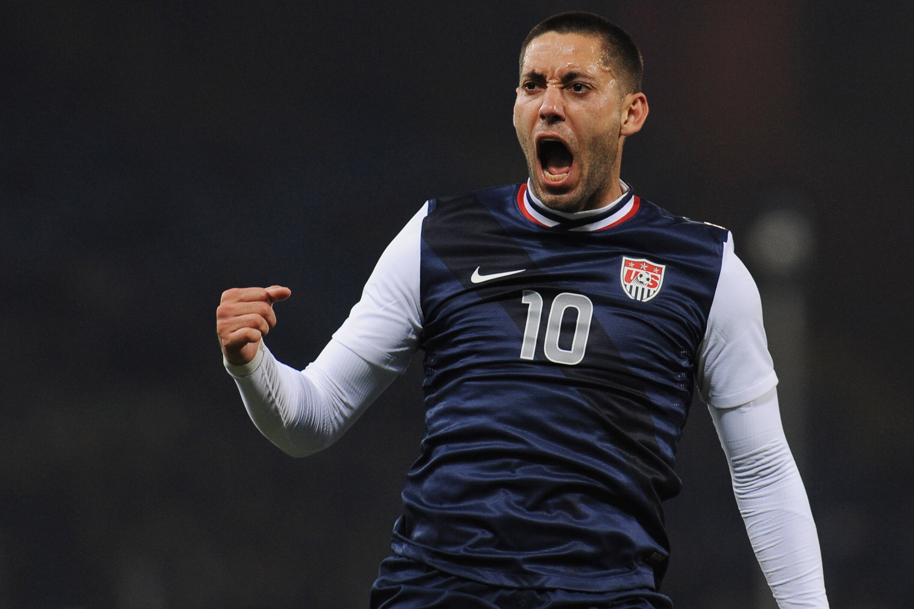 Clint Dempsey celebrates the opening goal during the international friendly match between Italy and USA at Luigi Ferraris Stadium on February 29, 2012 in Genoa, Italy. (Valerio Pennicino—Getty Images)