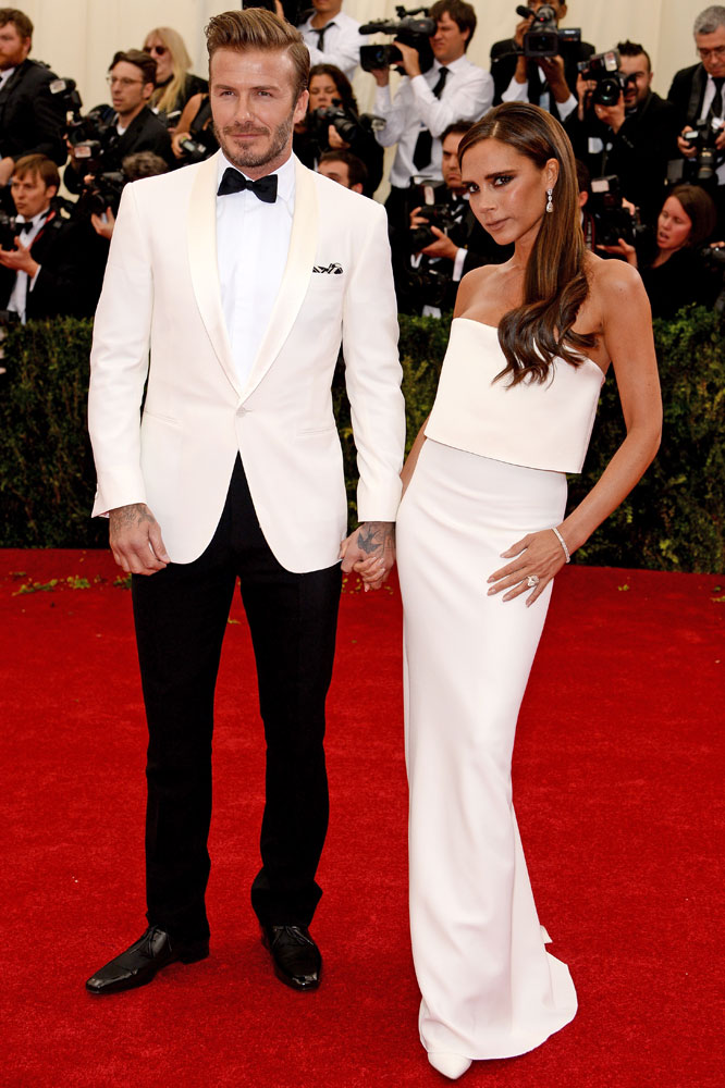 From left: David and Victoria Beckham attend the "Charles James: Beyond Fashion" Costume Institute Gala at the Metropolitan Museum of Art on May 5, 2014 in New York City.