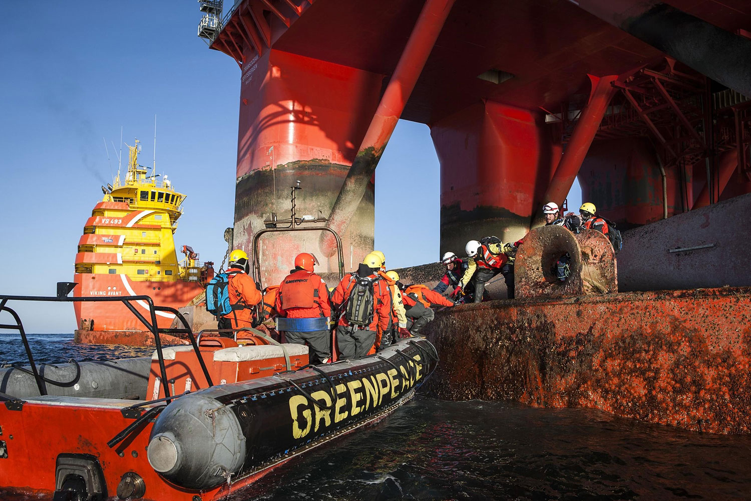 Greenpeace International activists from eight countries scale and occupy Statoil contracted oil rig Transocean Spitsbergen on May 27, 2014 to protest the company's plans to drill the northernmost well in the Norwegian Arctic at the Apollo Prospect of the Barents Sea, close to the Bear Island nature reserve. (Will Rose—Greenpeace/AFP/Getty Images)