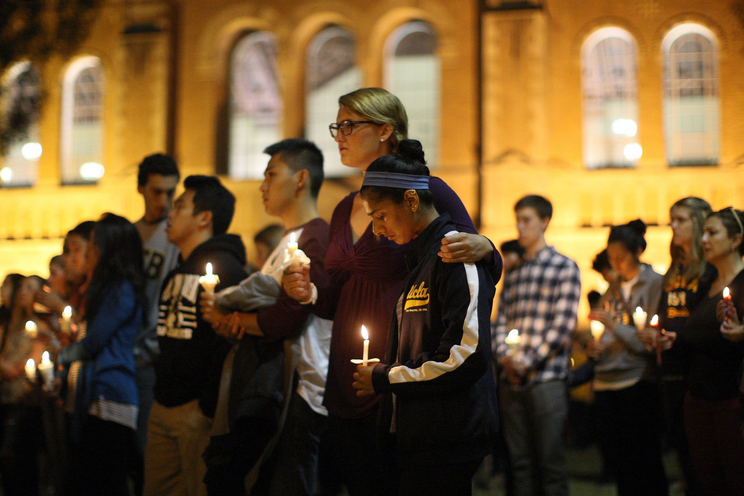 Students of UCSB and UCLA mourn at a candlelight vigil at UCLA for the victims of a killing rampage over the weekend on May 26, 2014 in Los Angeles.