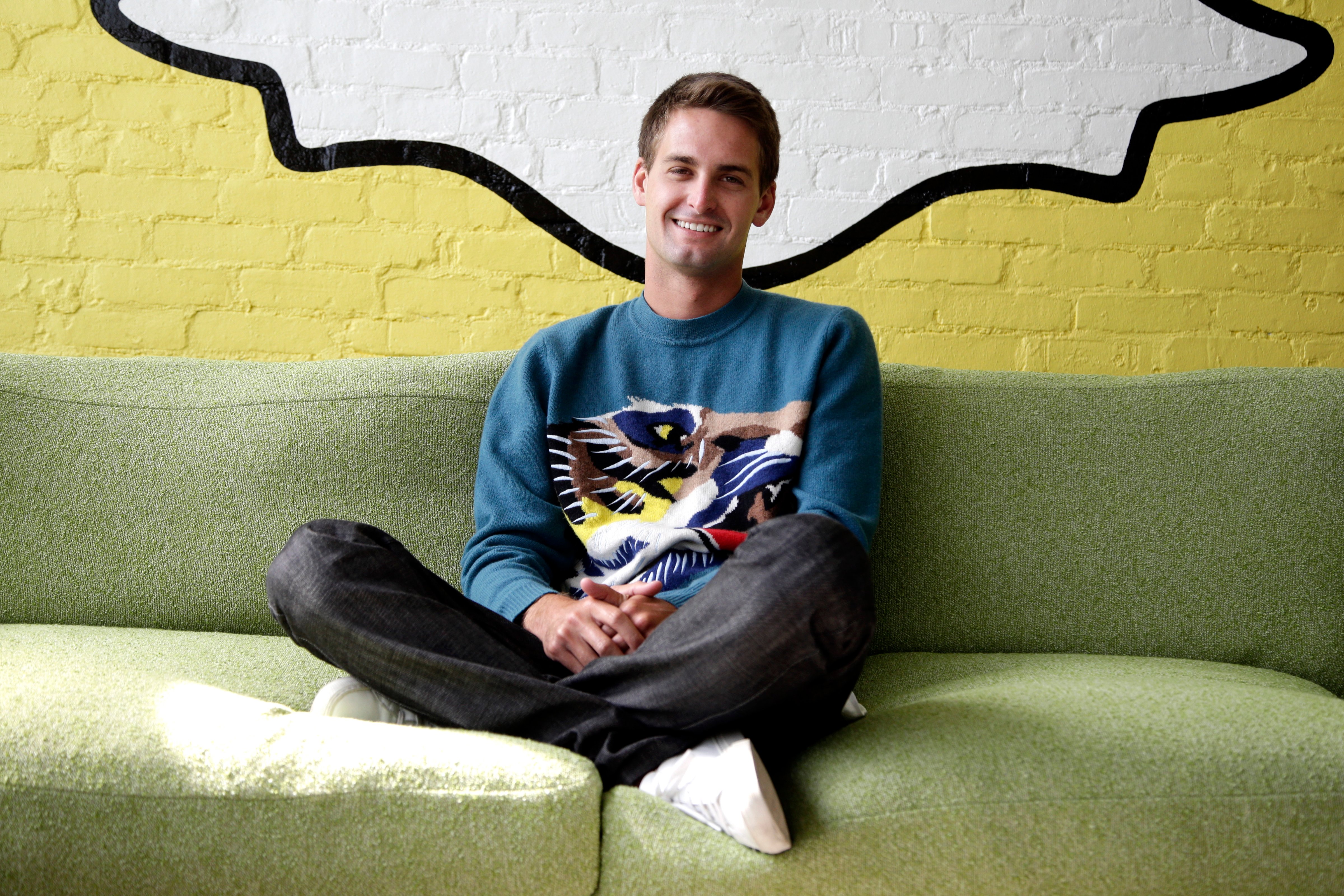 Snapchat CEO Evan Spiegel poses for photos, in Los Angeles, Oct. 24, 2013. (Jae C. Hong—AP)