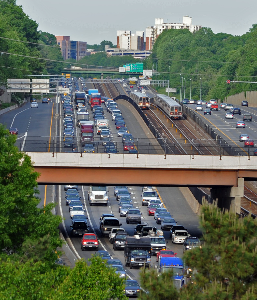 Metro trains move to and from the Vienna Metro Station alongside I-66 traffic in Fairfax, VA. on May 18, 2009. (Washington Post/Getty Images)