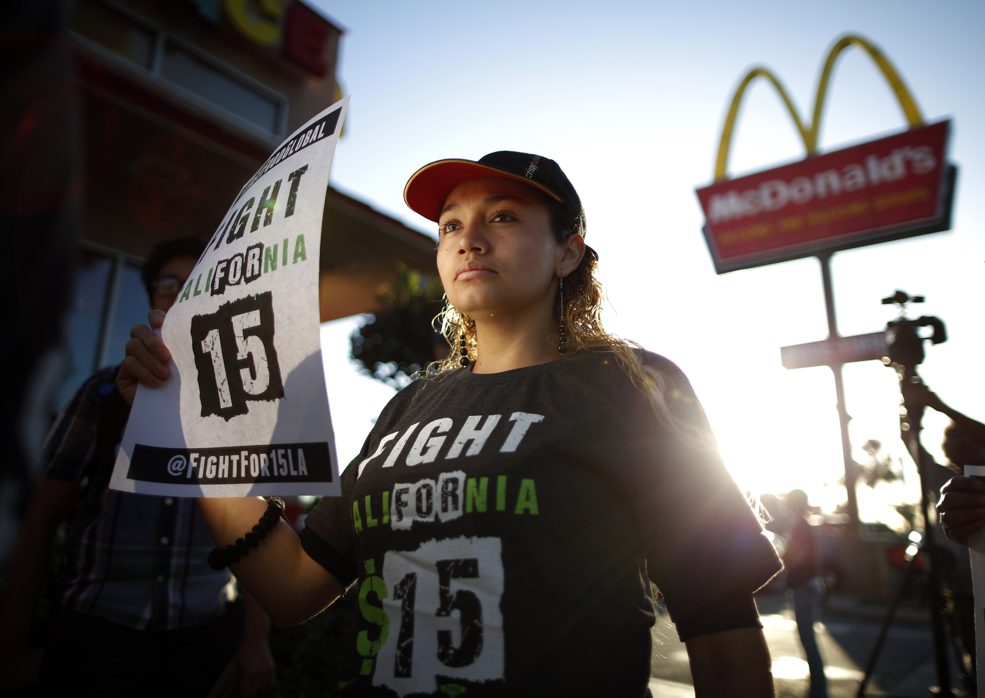 <b>Los Angeles:</b> Demonstrators take part in a protest to demand higher wages for fast-food workers outside McDonald's on May 15, 2014. (Lucy Nicholson—Reuters)