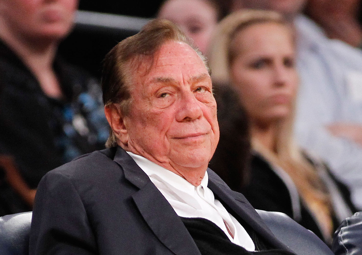 Donald Sterling watches the Clippers play the Los Angeles Lakers during an NBA preseason basketball game in Los Angeles on Dec. 19, 2011 (Danny Moloshok—AP)