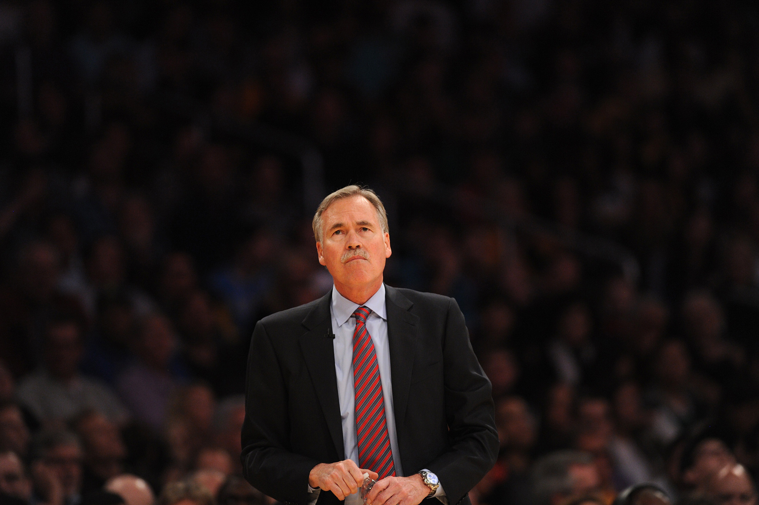 Mike D'Antoni watches from the sidelines during the NBA game between the Los Angeles Lakers and the Boston Celtics at the Staples Center in Los Angeles on Feb. 21, 2014 (Robyn Beck—AFP/Getty Images)