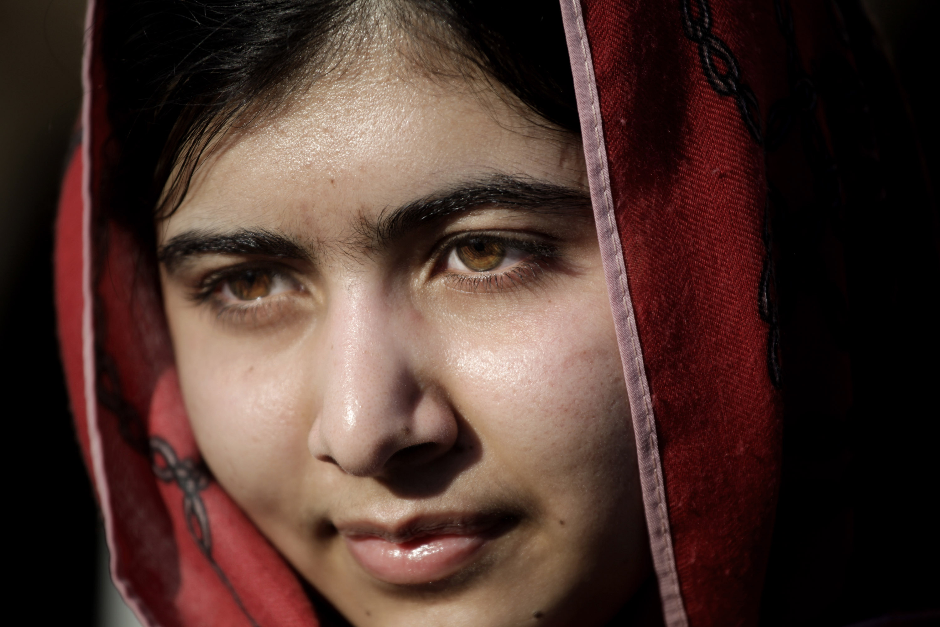Malala Yousafzai, visits Zaatari refugee camp in Jordan, Feb. 18, 2014. (Mohammad Hannon—AP)