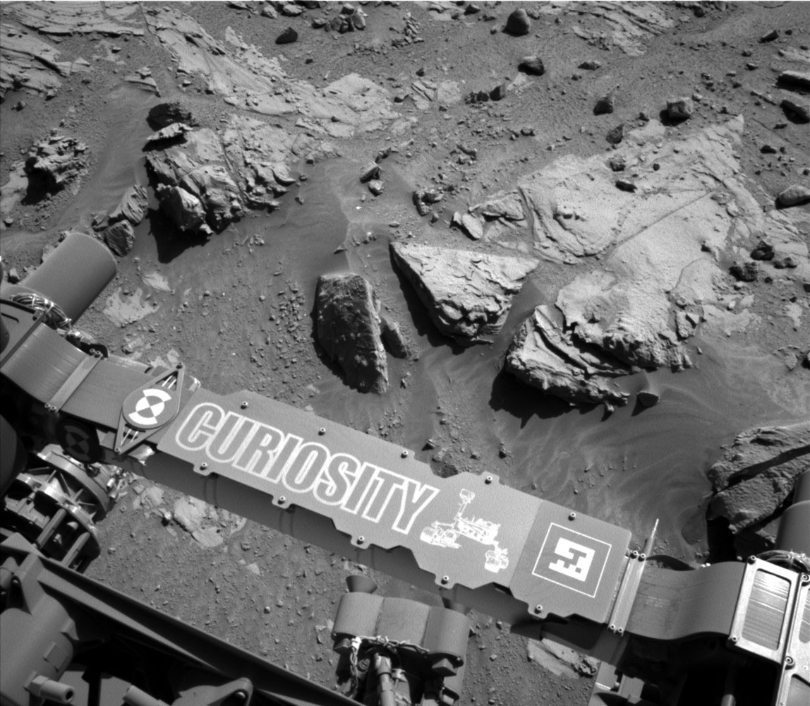 A self-portait taken by the Curiosity Rover's Navigation Camera (Navcam) on April 23, 2014 shows a sandstone slab on which the rover team has selected a target, ''Windjana,'' for close-up examination and possible drilling.