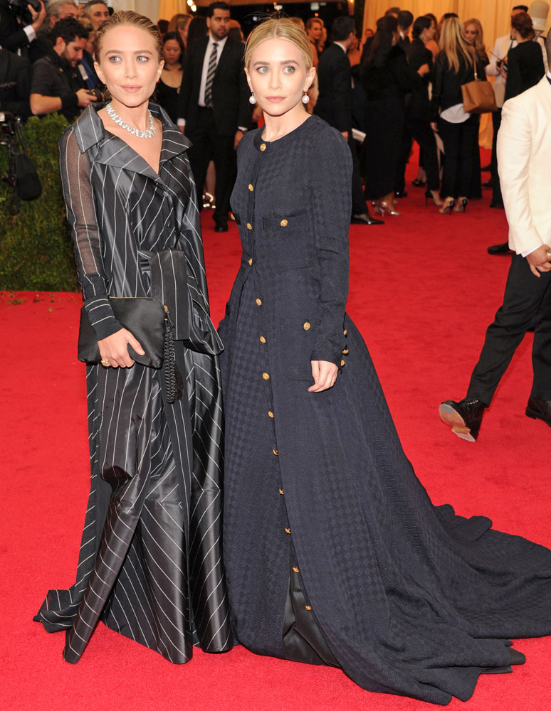 From left: Mary-Kate and Ashley Olsen attend The Metropolitan Museum of Art's Costume Institute benefit gala celebrating "Charles James: Beyond Fashion" on May 5, 2014, in New York City.