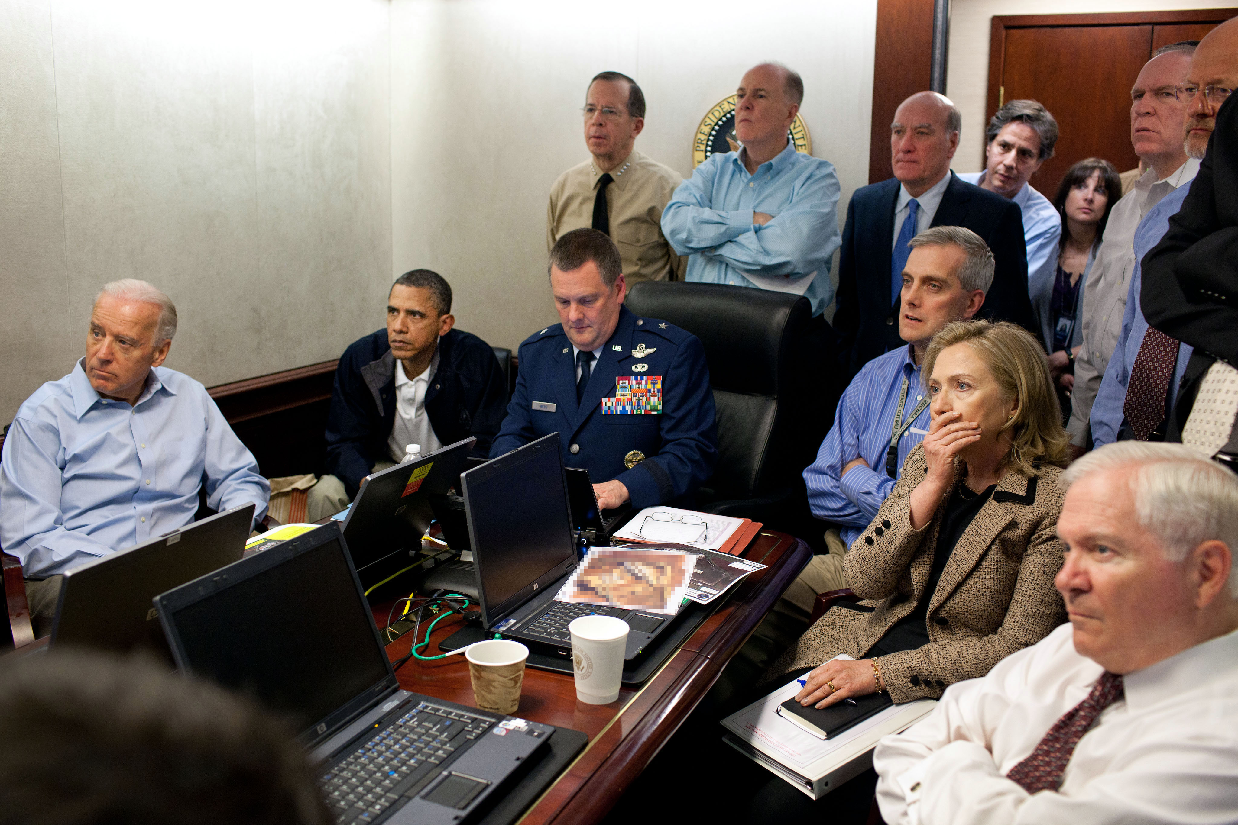 President Barack Obama, Vice President Joe Biden and former Secretary of State Hillary Clinton, along with with members of the national security team, receive an update on the mission against Osama bin Laden in the Situation Room of the White House in Washington, D.C., on May 1, 2011. (Pete Souza—The White House)