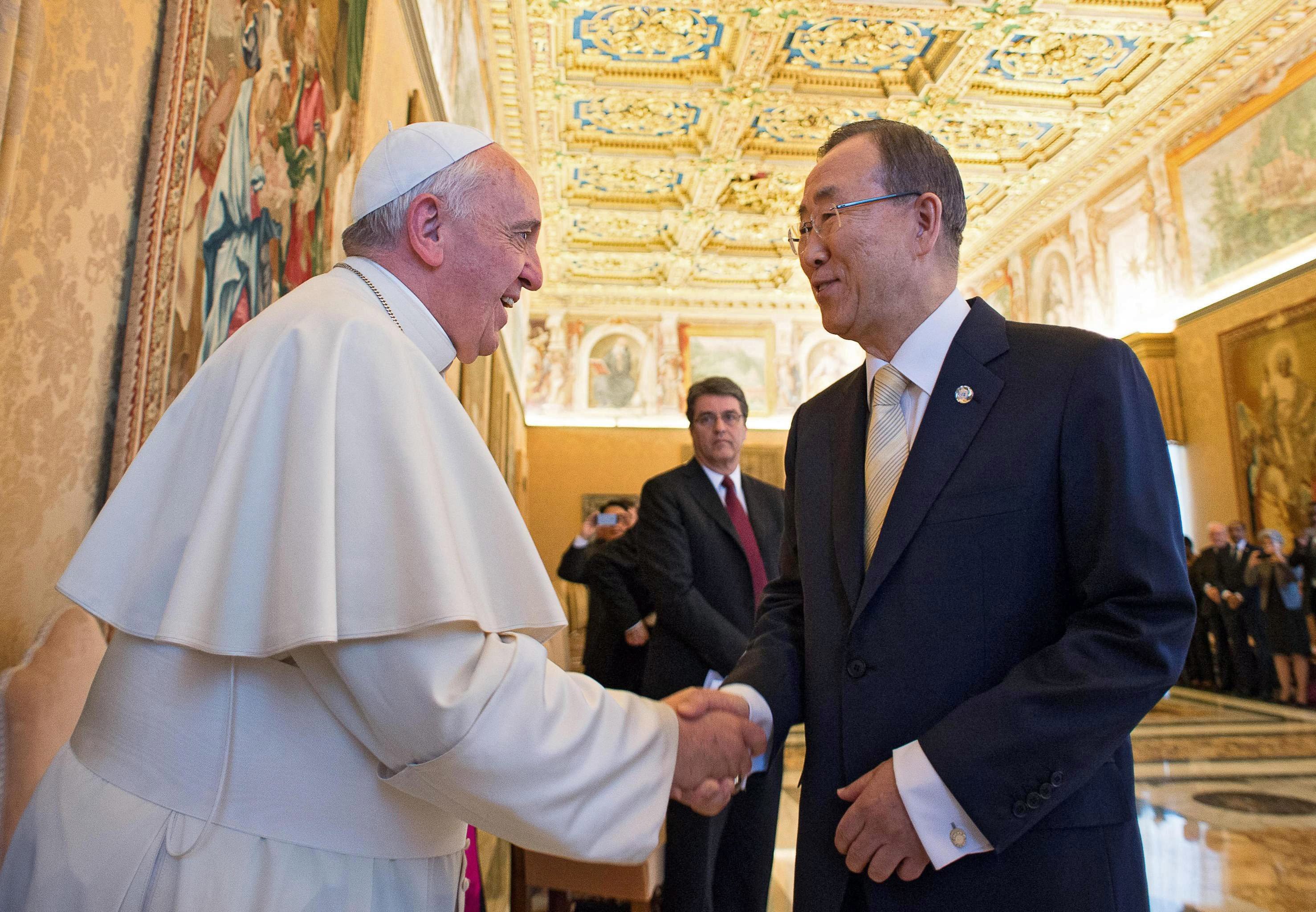 Pope Francis meets UN Secretary General Ban Ki-moon and members of UN System Chief Executives Board for the biannual meeting on strategic coordination in the Consistory Hall of the Apostolic Palace in Vatican City on May 9, 2014. (Osservatore Romano/EPA)